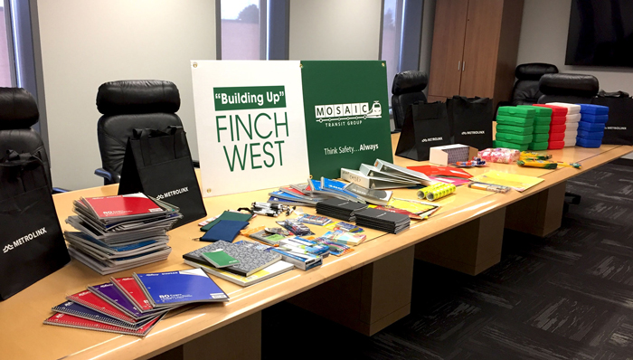 Table full of donated school supplies